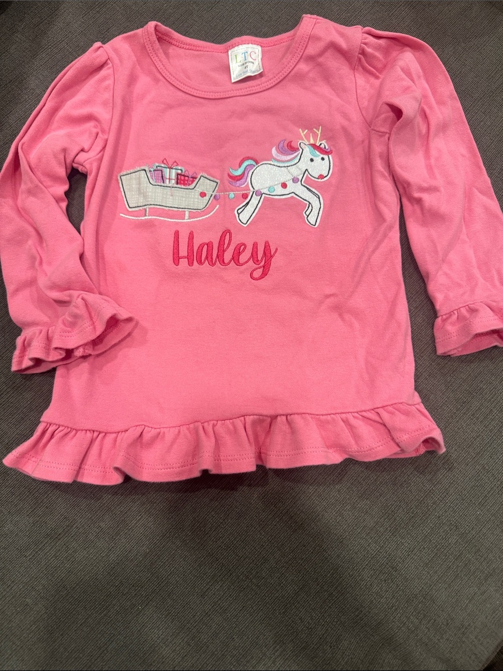 Pink Long-Sleeve Ruffle-Hem Top with Unicorn and Sleigh - Haley monogram
